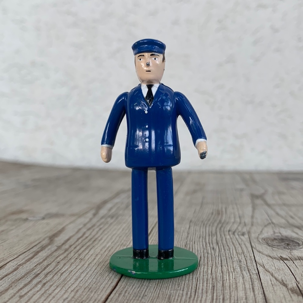 1990 metal Thomas the Train conductor collectible figure.